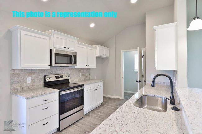 This image of another completed home, same builder, same floor plan. | Image 7