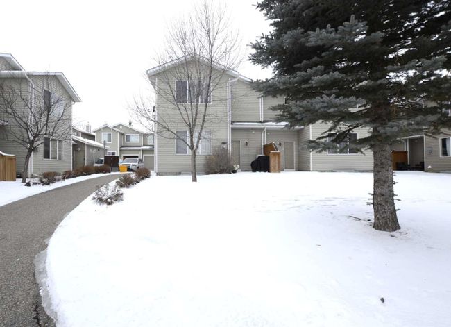 107 Bridleridge Manor Sw, Home with 3 bedrooms, 2 bathrooms and 1 parking in Calgary AB | Image 5