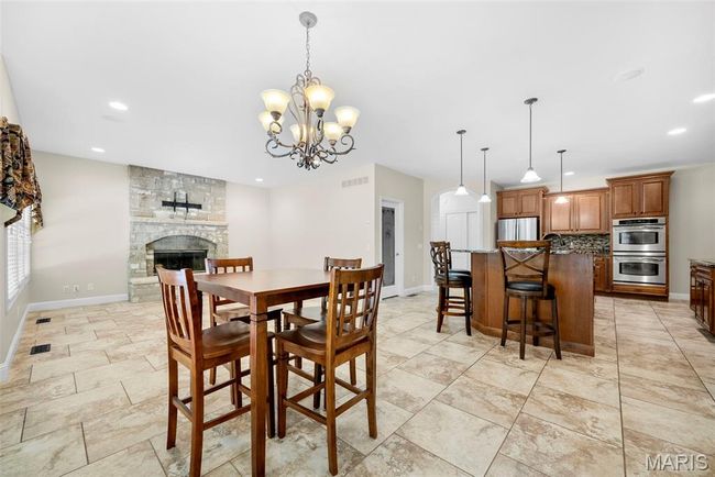 Breakfast Room & Hearth Room--Space for everyone!! | Image 13