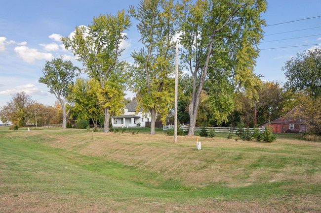This beautiful home sits on 3.23 acres. It has plum and apple trees, grapevines, blackberry and raspberry bushes. Great for the start of a hobby farm. | Image 47
