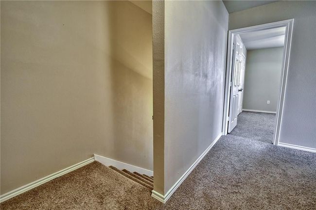 Corridor with carpet flooring | Image 6