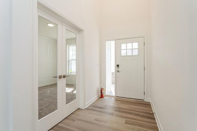 Photo is of the actual home. Make the best first impression with this bright and open foyer. | Image 7