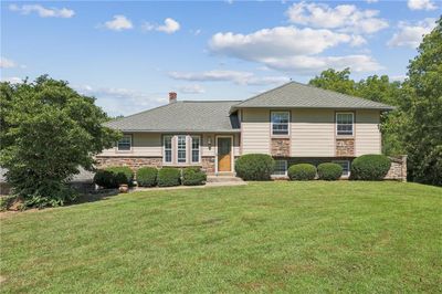 Tri-level home with a front yard | Image 1