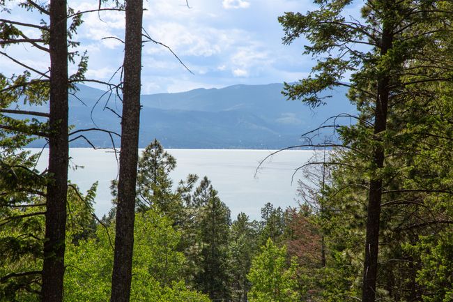 View of mountain backdrop featuring a large body of water | Image 59