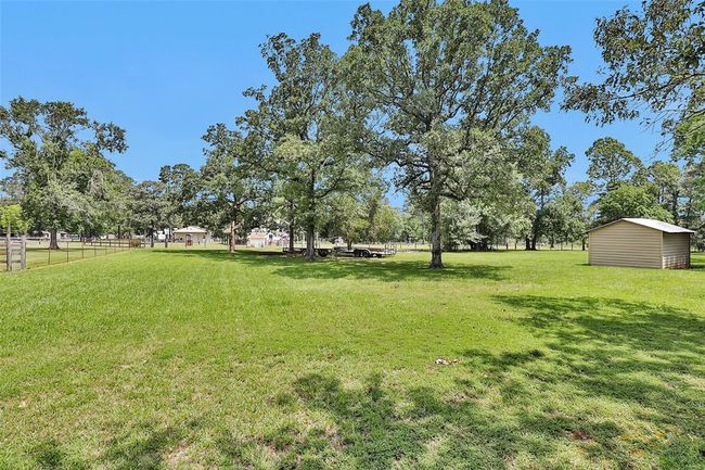 814 Whipporwill Rd, House other with 3 bedrooms, 2 bathrooms and 3 parking in Conroe TX | Image 43