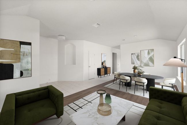 Computer staged Formal living and dining area with wood finished floors and vaulted ceilings | Image 4