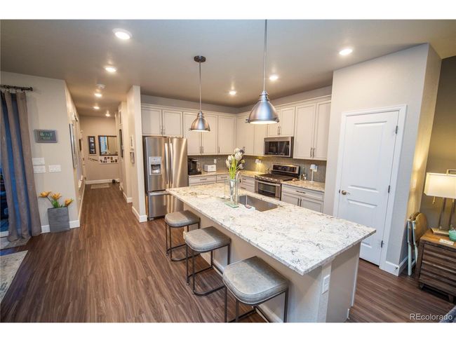 359 Courtfield Way, Townhouse with 3 bedrooms, 3 bathrooms and null parking in Castle Pines CO | Image 6