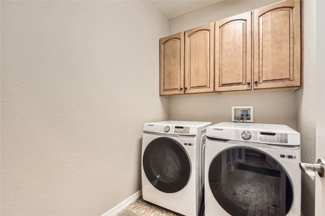 Laundty room off of the garage entrance. Washer and dryer included. Also stubbed for a utility sink. | Image 22