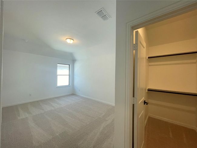 Unfurnished bedroom with carpet | Image 23