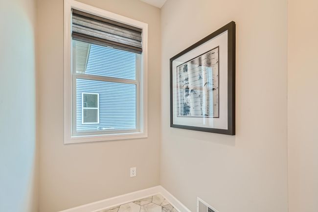 Photo is of the model. The mudroom offers an easy way to transition from outside to inside without added mess! | Image 11
