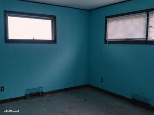 Unfurnished room featuring concrete flooring | Image 5