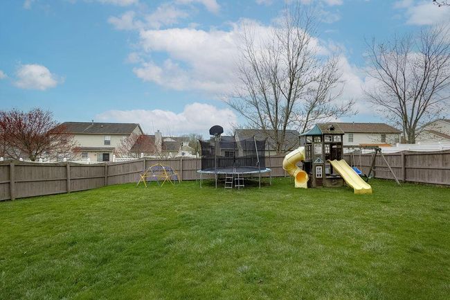 Fenced back yard. | Image 46