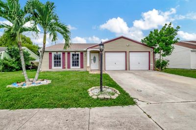 5279 Canal Circle W, House other with 3 bedrooms, 2 bathrooms and null parking in Lake Worth FL | Image 1