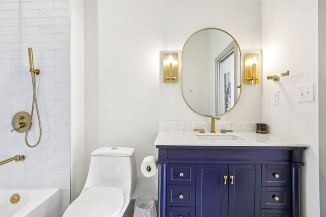 Full bathroom featuring vanity and shower / bathtub combination | Image 26