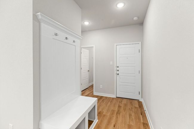 Mudroom featuring recessed lighting, light wood-style flooring, and baseboards | Image 17