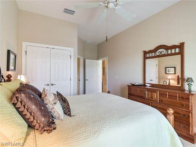 Bedroom featuring ceiling fan and a closet | Image 23