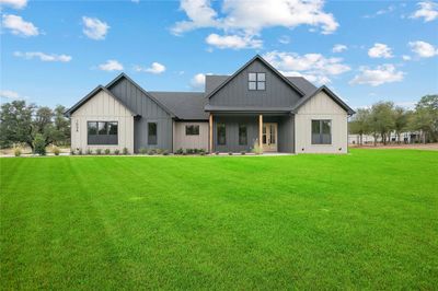 Front of property with a lawn | Image 1