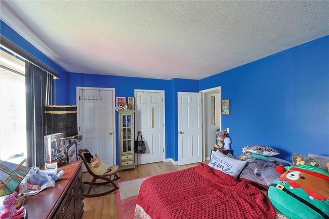 Bedroom multiple closets | Image 12