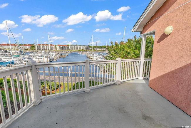 Balcony featuring a water view | Image 28