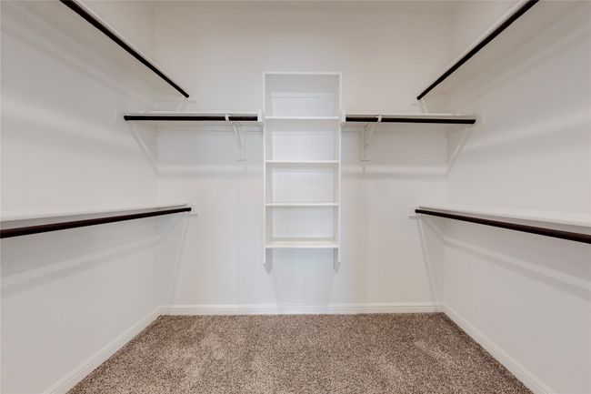 Spacious closet with carpet | Image 22