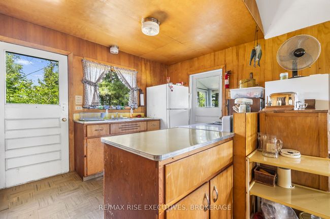 1326 Ridge Lane, House other with 2 bedrooms, 1 bathrooms and 2 parking in Seeleys Bay ON | Image 11