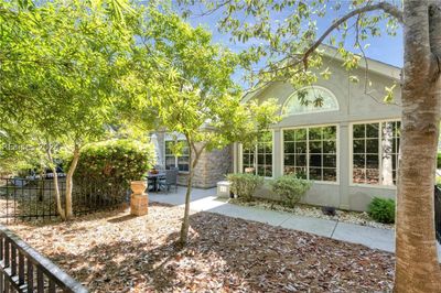 The front door is on this side of the unit and this part of the yard is fenced in! | Image 3