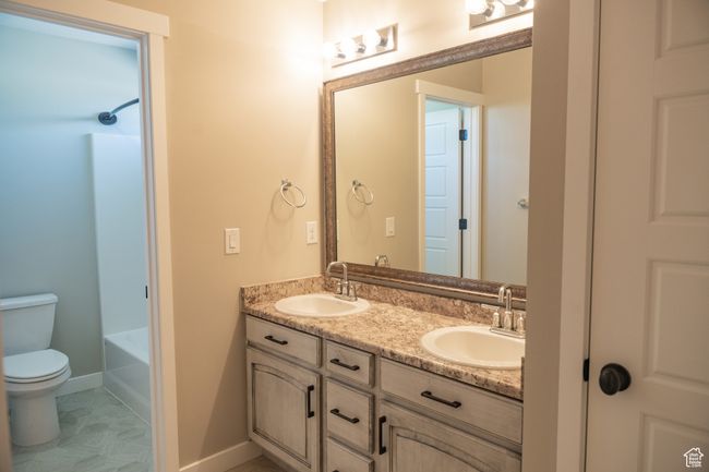 Full bath featuring double vanity and shower combination | Image 21