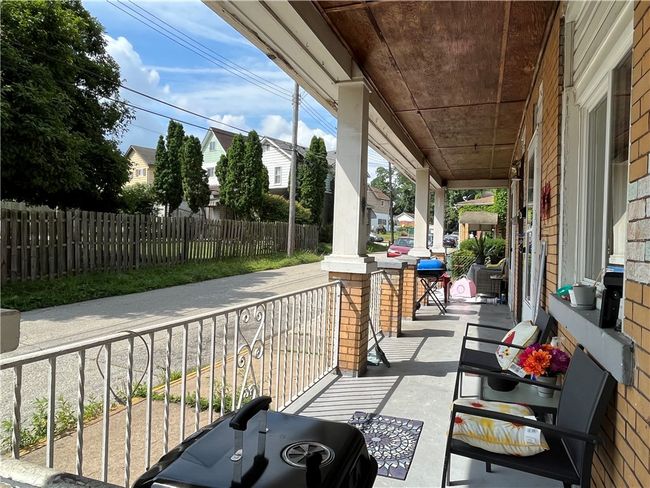 Shared covered front porch for both units to enjoy... | Image 4