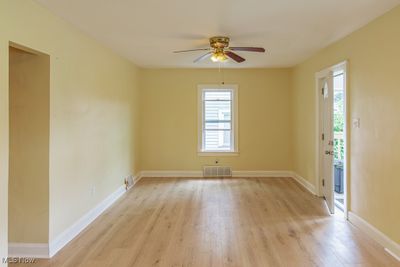 Unfurnished room featuring light hardwood / wood-style flooring and ceiling fan | Image 3