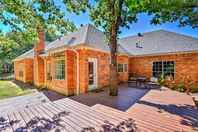 Wooden terrace with outdoor dining space | Image 32