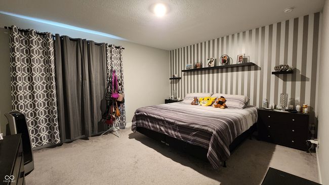 bedroom with carpet floors | Image 20