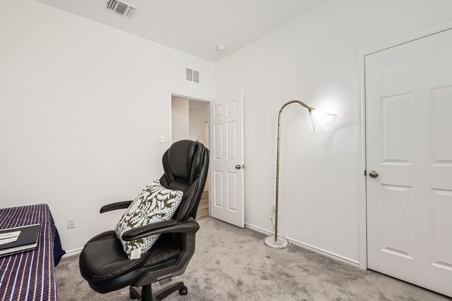 Home office featuring light colored carpet and baseboards | Image 20