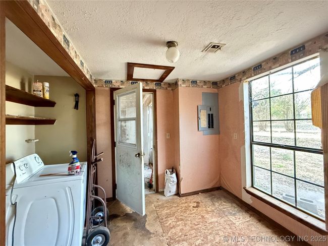 LAUNDRY ROOM BETWEEN THE KITCHEN AND GARAGE, ALSO HAS ENTRY TO THE GUEST BATHROOM | Image 12