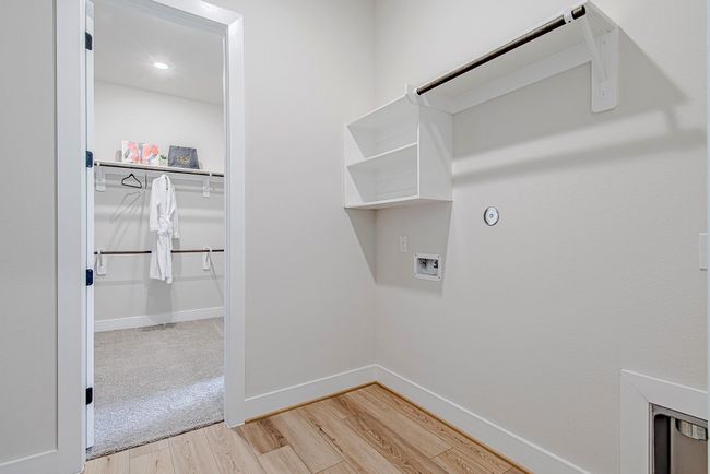 A unique layout connects the primary closet directly to the laundry room, adding ease to everyday living. | Image 29