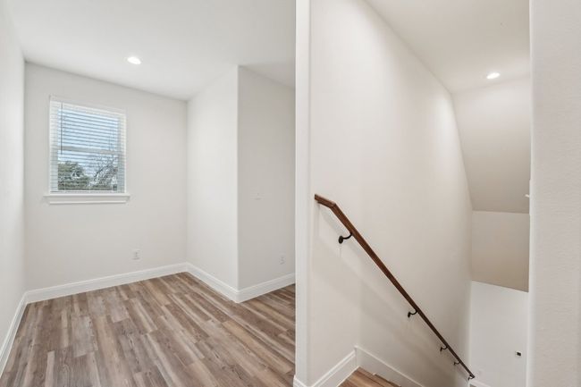 Staircase featuring recessed lighting, baseboards, and luxury vinyl floor | Image 23