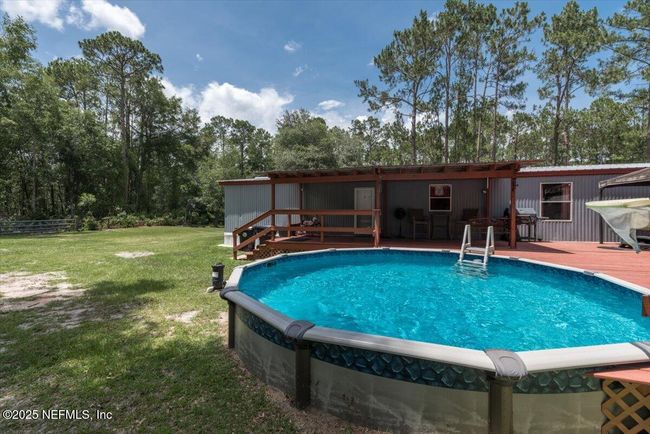 Pool/ Rear Exterior View. | Image 37