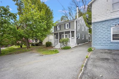 View of property with a porch | Image 2