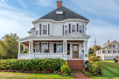 Beautiful Victorian home with wrap-around porch, ocean frontage, large yard, and plenty of parking. | Image 2