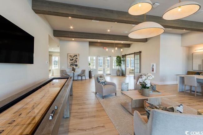 Living area featuring beam ceiling, recessed lighting, light wood-type flooring, and baseboards | Image 20