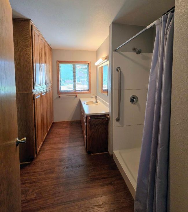 Updated 3/4 bath with walk in shower with grab bars | Image 23