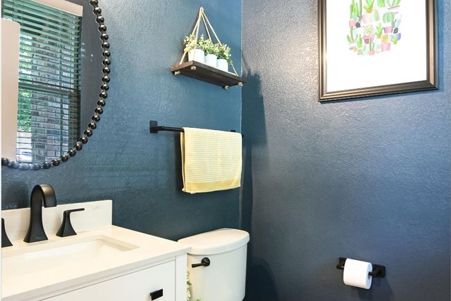 Bathroom with toilet and vanity | Image 25