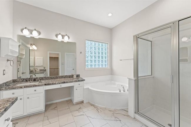 Wonderful bathroom with two sinks, spa and shower. | Image 23