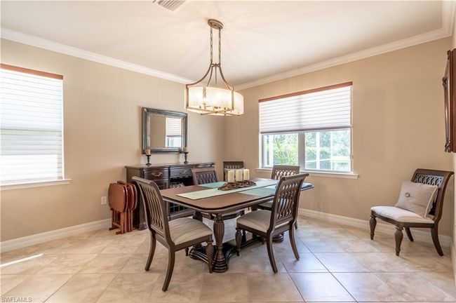 Office space featuring crown molding and dark hardwood / wood-style flooring | Image 19