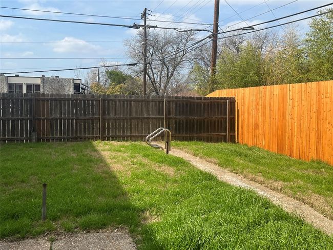 View of yard featuring a fenced backyard | Image 16