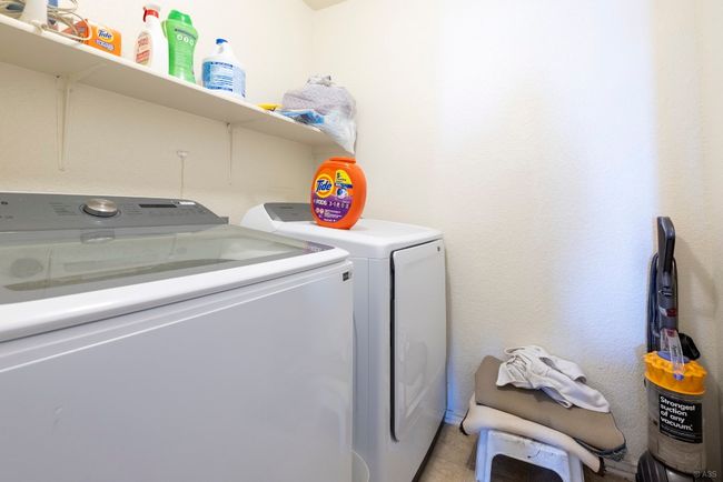 Laundry area with washer and dryer | Image 12