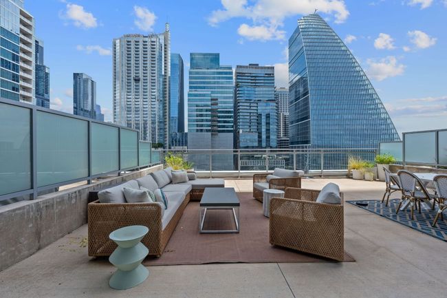 View of patio / terrace featuring outdoor lounge area and a skyline view | Image 21