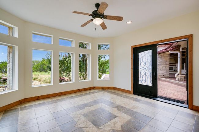 This room was enclosed and a mini-split was added to make it a year round, functional room. It overlooks the pond, the window garden, patio and is a few steps from the 3/4 bath off the kitchen. I think this room is where the small ideas become big! | Image 33
