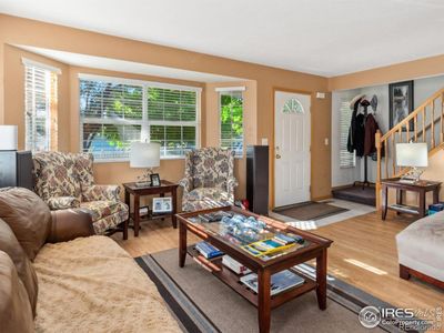 Living room with wood floors | Image 3