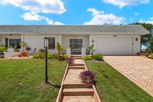 386 Club Manor Dr, SUN CITY CENTER, FL, 33573-5866 | Card Image