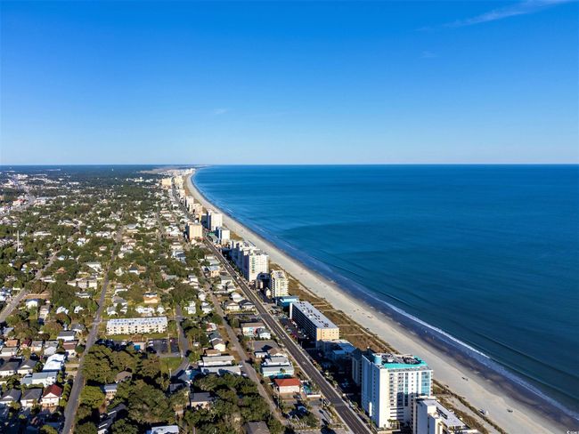 Aerial view of waterfront with a beach | Image 27